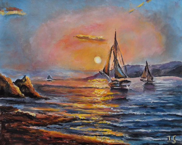 Coucher soleil bateaux côte rocheuse