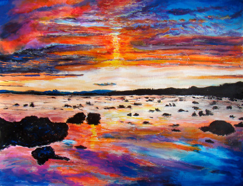 Coucher sur plage avec rochers rouges bleus